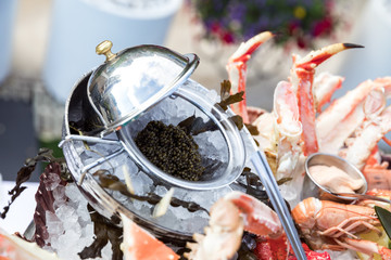 Black caviar served with seafood