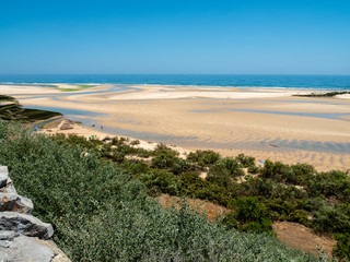 Fototapeta na wymiar View of the coast below Forte de Cacela