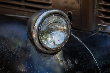 vintage and retro headlight of a classic auto
