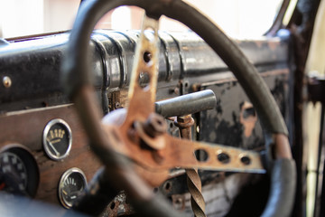vintage and retro gear shifter of a classic auto that needs repair