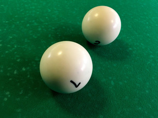 two billiard balls on the table