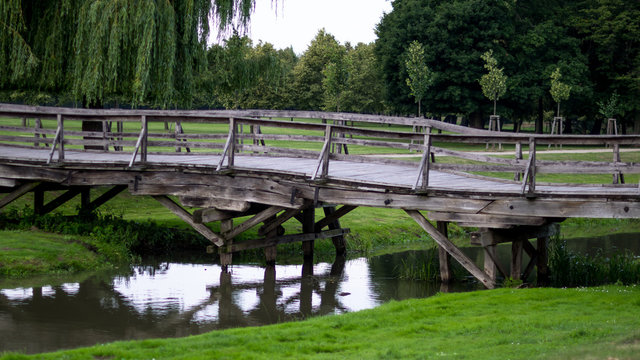 Wooden bridge leading to the park side view