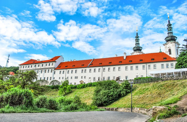 Prague, Czech Republic - May 9, 2014: Strahov Monastery in Prague against the blue sky. Here, for over 800 years, there is the old library. The oldest books date from the middle of the XII century.