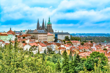 Fototapeta premium Panorama of the St. Vitus Cathedral in Prague at day in the blue sky.