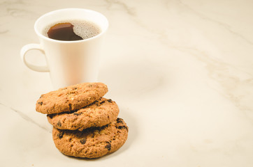 coffee cup and homemade cookies with chocolate/Breakfast whith coffee cup and homemade cookies with chocolate, copyspace