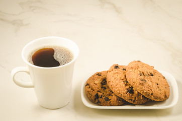coffee cup and homemade cookies with chocolate/Breakfast whith coffee cup and homemade cookies with chocolate, selective focus