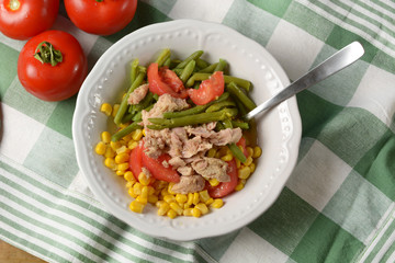 salad of green beans, corn, tomato and tuna