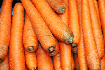 Group of carrots. Organized, fresh carrots on the market.
