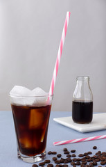 Drinking Glass and Bottle filled with Cold Brew Coffee