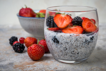 Healthy  superfood, chia pudding with berries, strawberry and mint