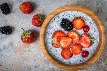 Healthy  superfood, chia pudding with berries, top view
