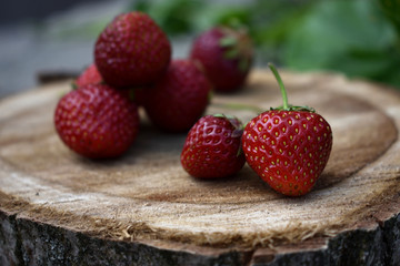 Strawberry fruit on the wooden