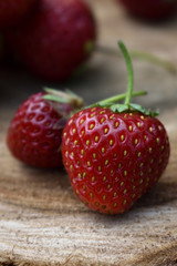 Strawberry fruit on the wooden