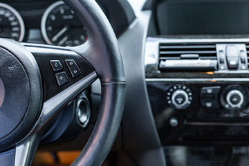 Naklejka premium car interior. Modern car speedometer and dashboard. Luxurious car instrument cluster.