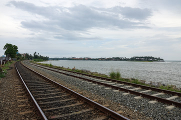 Coastal railway tracks along the ocean. The coast of Sri Lanka