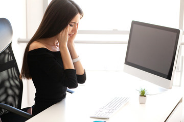 Pain. Health healthcare care concep. Portrait of sad upset accountant holding hand on head suffering from syndrome symptom head ache feeling bad sitting at desktop. Health healthcare care concept