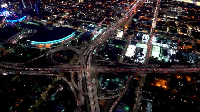Aerial view of the 110 and 10 highway intersection in Downtown Los Angeles in 4K from a helicopter