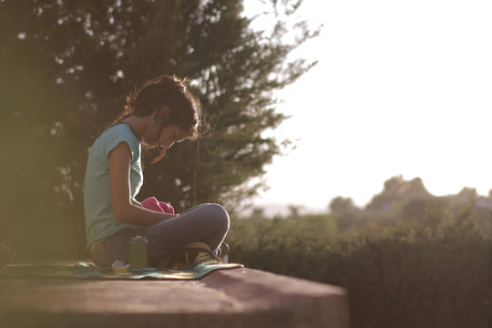 beautiful woman by the pool with smartphone