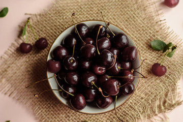 Country style. Cherries in a plate. Seasonal fruits. Summer harvest.