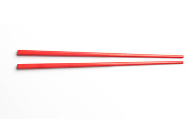 red chopsticks isolated on white