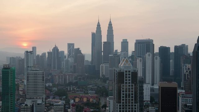 Timelapse of Kuala Lumpur city skyline during beautiful sunrise