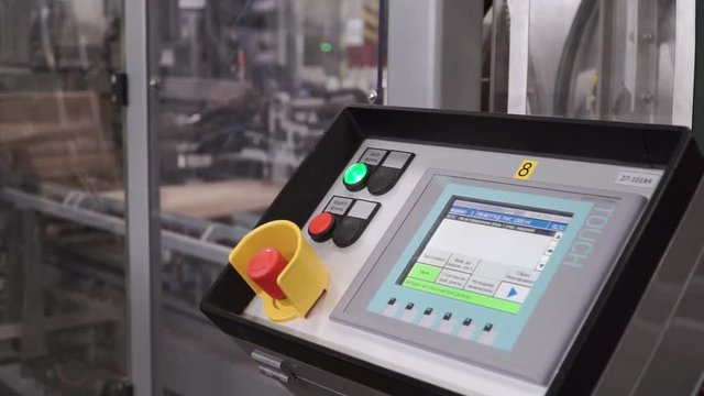 Technical display on control panel with electric devices. Clip. Electric Control Panel. Interior of automatic line for the production of feed. Control panel of automated production machinery equipment
