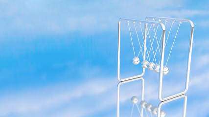 Newtons cradle or Pendulum blue sky  background