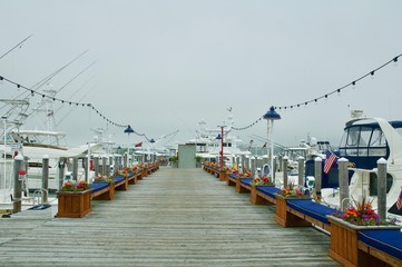 Montauk Yacht Club dock on a cloudy day in Montauk, New York. 