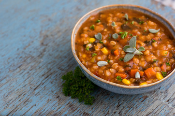 Hearty Bean Mix Soup in Blue Bowl