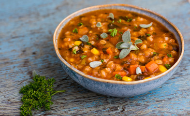 Hearty Bean Mix Soup in Blue Bowl