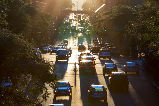 Fototapeta Traffic on 42nd Street through Midtown Manhattan at rush hour in New York City