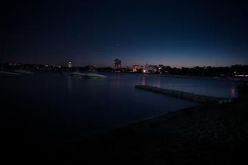 Long-exposure of boats on Bde Maka Ska, formerly Lake Calhoun, Minneapolis, Minnesota