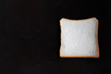 Sliced Wheat Bread on dark background
