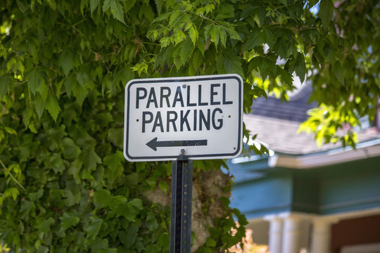 Parallel parking sign with tree