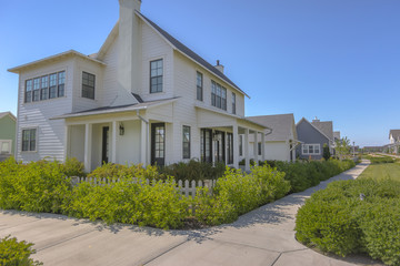 Sidewalks with homes in a beautiful neighborhood