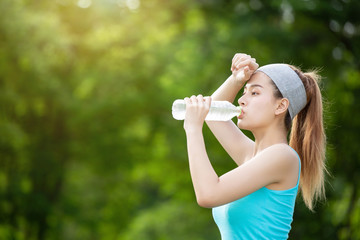 Girl drinking water exercise.