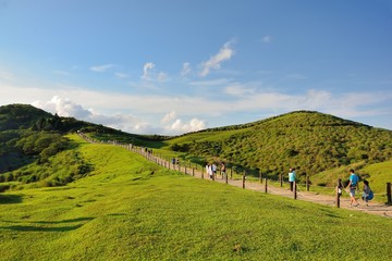 Qingtiangang Grassland in Taipei Yangmingshan,Taiwan.Photo taken on: JULY 1,2018,Shooting spot of Qingtiangang Grassland in Taipei Yangmingshan,Taiwan R.O.C. People are tourists.