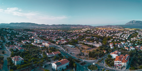 Fototapeta premium Amazing panoramic view to the Datca (Datcha) city in Turkey, city between mediterranean and aegean seas, aerial photo in the sunny evening