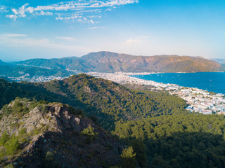Aerial photo of Marmaris bay with beautiful mountains and island on the background, a lot of yacht and sailboat