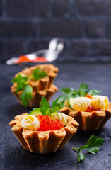 tartalets, butter and salmon caviar