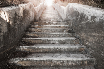 Old concrete stairway with glowing end