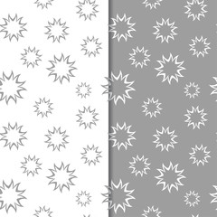 White and gray floral backgrounds. Set of seamless patterns