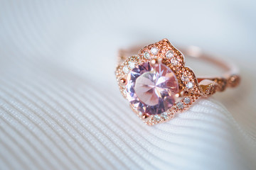 Jewelry luxury pink gold sapphire gemstone ring background