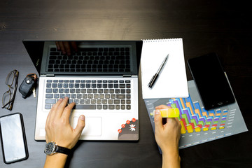 Business man working on a laptop
