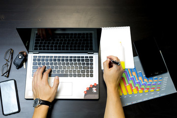 Business man working on a laptop