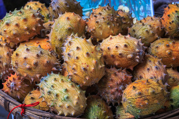 Kivano known as horned melon looks like cucumber on the counter of the Chinese market.