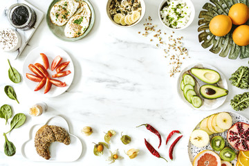 Photography of variuos bio fruits and vegetables on the marble table. Healthy food background with...