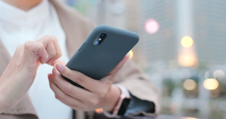 Woman use of cellphone at night