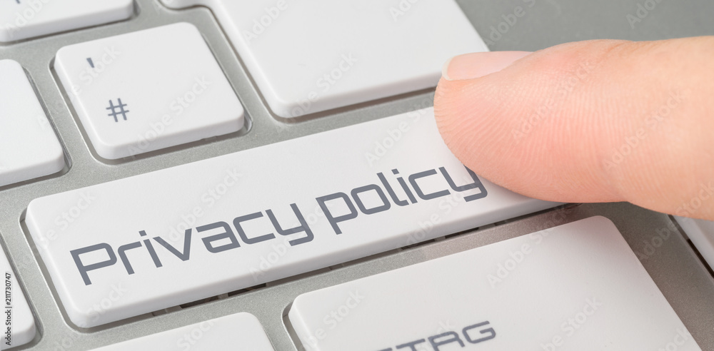 Wall mural a keyboard with a labeled button - privacy policy