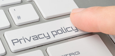 A keyboard with a labeled button - Privacy policy